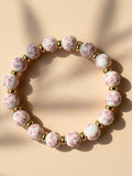 Eva Bracelet – Elegant Porcelain Beads with Alloy Spacer Discs Bracelet Handcrafted by Artist Kristine Keina