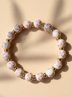 Eva Bracelet – Elegant Porcelain Beads with Alloy Spacer Discs Bracelet Handcrafted by Artist Kristine Keina