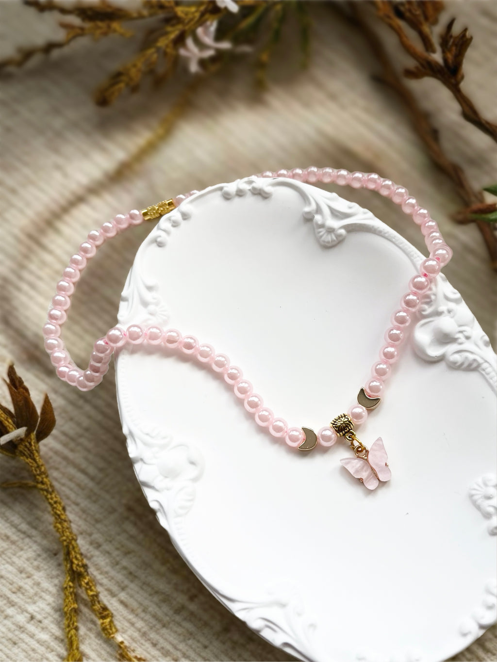 Little Ladies Pink Pearl Imitation Butterfly Half Moon Necklace by Kristine Keina. Available in Two Sizes