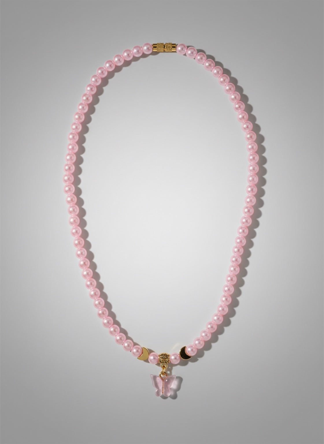 Little Ladies Pink Pearl Imitation Butterfly Half Moon Necklace by Kristine Keina. Available in Two Sizes