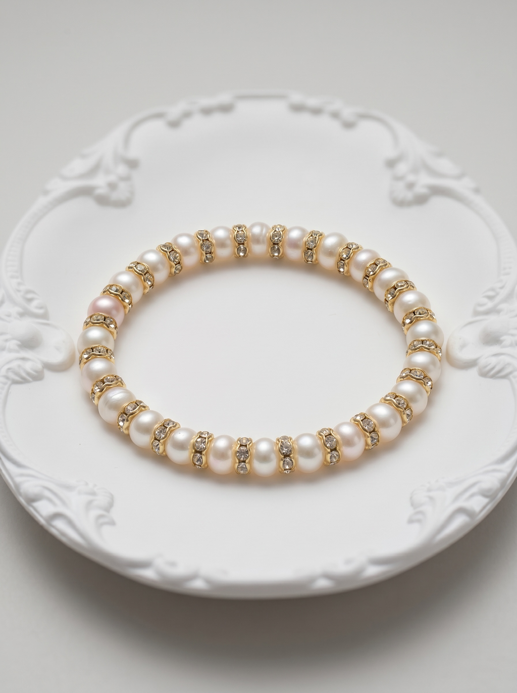 Elara Bracelet — Made with Natural Cultured Freshwater Pearls, Gold‑Plated Alloy Findings and Sparkling Rhinestone Spacers Handcrafted by Artist Kristine Keina